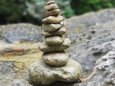Stacked smooth stones representing mental and physical equilibrium